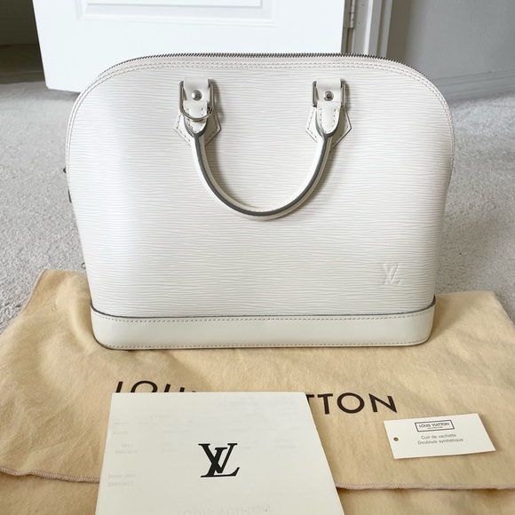 Louis Vuitton Handbags - Authentic Louis Vuitton ivory EPI Alma PM bag